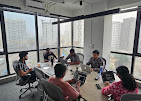 Founder Viraj Saindane presenting growth strategy to a manufacturing client